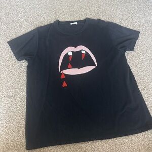 Saint Laurent Black Tee with Vibrant Graphic